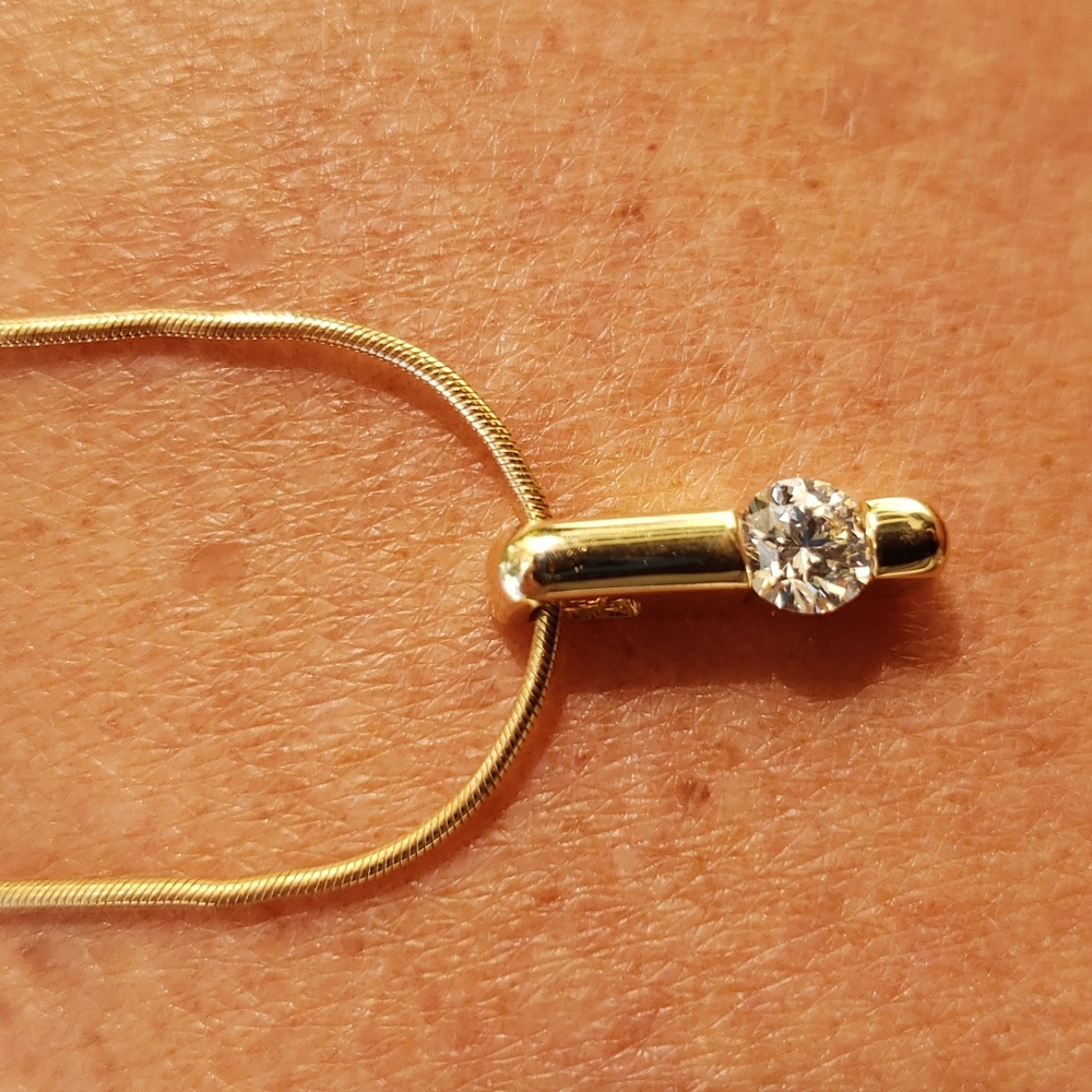 Diamond necklace in 14 karat gold, from Mayor's Jewelers. Gorgeous diamond!